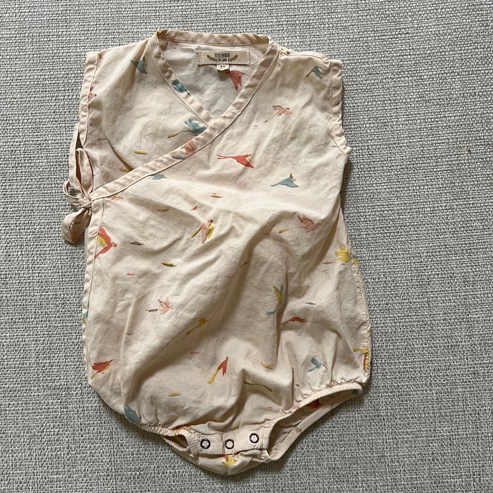 Red caribou sleeveless onesie